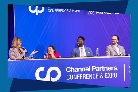 A photo of a panel discussion at channel partners conference and expo